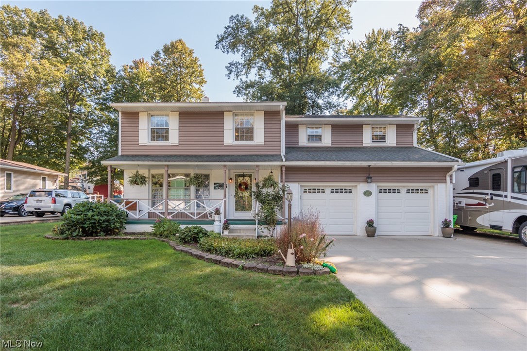 A stunning 4 bedroom, 2.5 bath colonial in an amazing Tallmadge neighborhood. With a lovely .4 acre lot, this yard is perfect. The first floor features natural wood floors in the formal living room , family room, and formal dining room. There is an awesome 18x14 4 season sun room off of the family room. The sun room also opens to a patio area. An updated eat in kitchen has a 2 sided pantry, and a very cool pocket door. The master suite is 20x12, and all of the bedrooms have natural wood floors. There is additional parking area next to the 2 car garage, full basement, a foyer, a front porch, and so much more.
