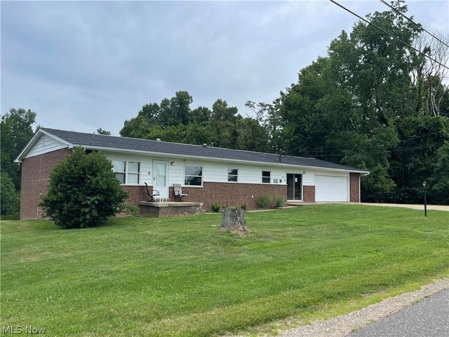 This Brick Ranch on 1-Acre...Has so much potential... This property has been a rental..was rented as 6 bedrooms..Technically it has 4 Bedrooms 3 on the first floor..1 in the basement... Property Has 2-Full Kitchens, 2-laundry areas as well a double car garage space on the first level,, and a 1 car garage on the bottom level.. a corner nesled in the trees back yard!