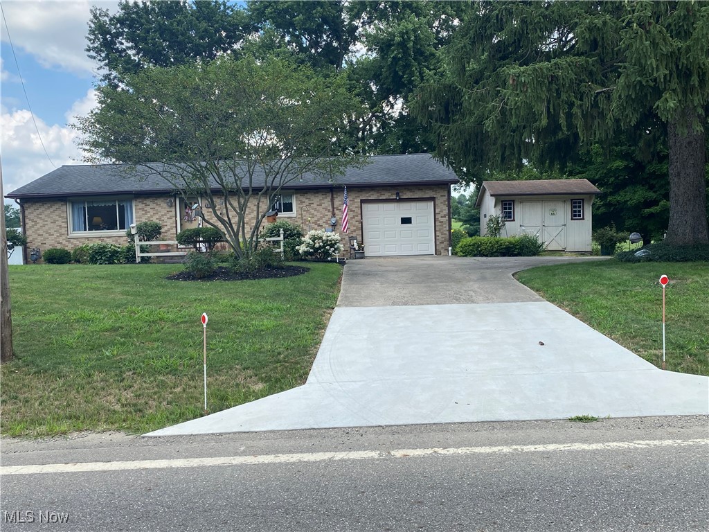 Quality built Brick Ranch in United School district. Open floor plan with LR and eat-in kitchen. Hardwood flooring thru out living areas and newer Luxury Vinyl in the kitchen. Two expansive sized bedrooms. Master bedroom with half bath. Bedroom two used a bedroom/den and has a sliding door leading to a beautiful screen porch with TREX flooring that over looks a quiet back yard. Small outdoor patio area to enjoy the birds and outdoor nature. New furnace and hot water tank in December 2024. Maintenance has been a priority with this property. Electric service is being updated. Full basement has been water proofed. Water softener included. Storage shed approx 12x10. The property is clean and MOVE IN ready... "looking for someone to love it,too!"