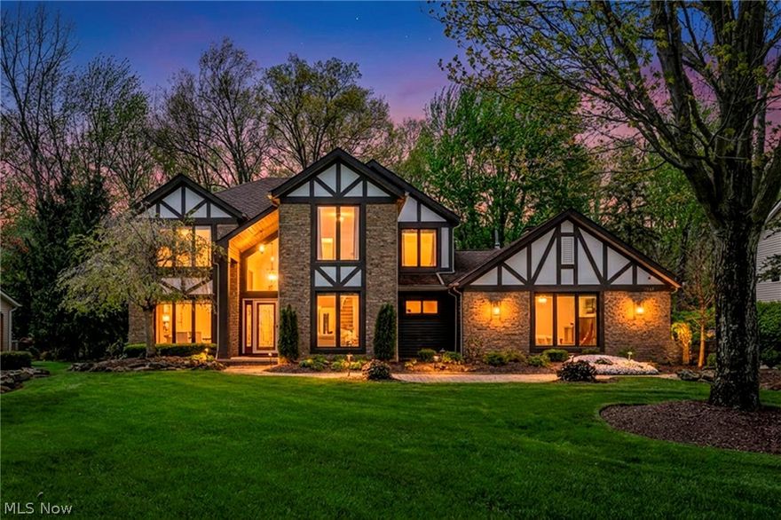 (Video Available) One-of-a-kind Westlake beauty! Completely updated & remodeled w/private, resort-style backyard that truly sets this home apart! Situated on a magnificent wide lot backing to Metro Parks, this fully fenced oasis features a stunning kidney-shaped in-ground pool, expansive custom paver patio/walkways, hot tub, tranquil koi pond, outdoor kitchen, plus dedicated pool house for equipment—perfect for entertaining/relaxing in total privacy. Freshly updated exterior showcases mature landscaping & desirable side-load garage w/additional storage space. Step inside to a grand foyer highlighted by custom spindled staircase, setting the tone for the quality and craftsmanship throughout. True gourmet kitchen has been thoughtfully expanded and is sure to impress, featuring custom glazed cabinetry, two oversized islands w/breakfast bar seating, dual wall ovens/cooktop, sought-after Sub-Zero refrigerator, under-cabinet lighting, added separate buffet/refreshment bar. Two spacious dining areas flow seamlessly into the dramatic vaulted family room w/floor-to-ceiling brick fireplace, custom built-ins, & large bay window—filling the home with natural light. Private, oversized first-floor laundry room includes washer/dryer, utility sink, ample workspace. New amazing owner's bath. Updated premium windows (2009). Countless updates/exceptional attention to detail throughout, this home is truly move-in ready and a rare opportunity.