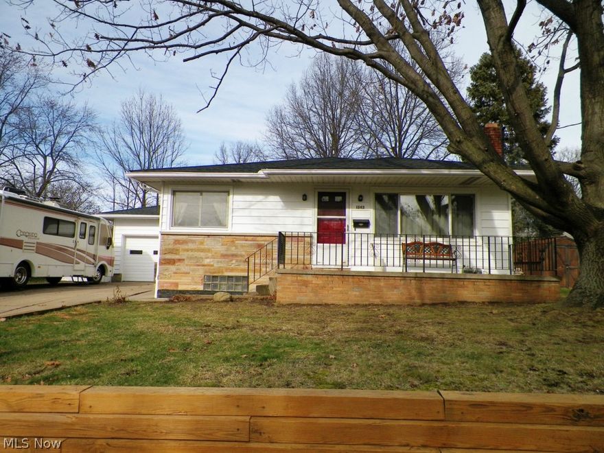 Beautifully renovated ranch in the heart of West Akron! Updates include: remodeled kitchen 2014 (custom cabinets, counters, sinks (added a prep sink) added new dishwasher, wiring, lighting, and floor. Exterior and interior painiting 2014. Roof 2014, New carpet in finished basement. Wiring in Rec room. Hardwood floors throughout 1st floor except back bedroom. Wood burning fireplace in cozy family room with open floor plan to dining room and center hall. First floor master! Nice privacy fence surrounds back. Home warranty included with acceptable offer! Easy to show.