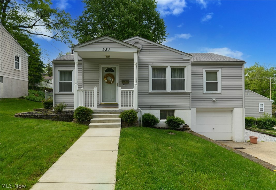 This beautifully cared for raised ranch near the Highland Square area faces a park-like setting and provides wooded views in the city. The warm gas fireplace and original oak floors welcome you into the living room and dining area as you enter the home. The inside also features recently painted rooms with restored, original oak floors in the hallway and in all three bedrooms. The L-shaped kitchen comes with a lunch counter that is also perfect for morning coffee and breakfast. Through the kitchen to the great outdoor space featuring a large 10' x 28' composite deck that overlooks the above ground pool, small pond with a patio area and treehouse, all enclosed in a fenced-in yard. Close walking distance to shops and restaurants at Merriman and Market intersection as well as in Highland Square.