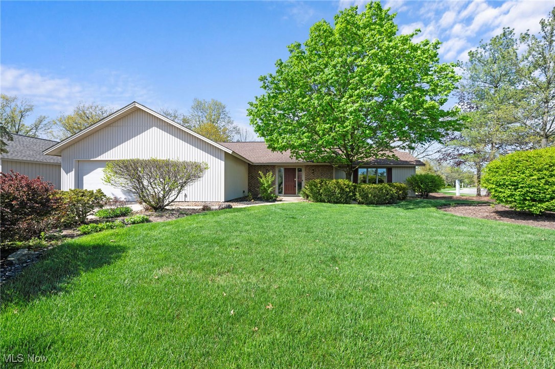Discover this stunning 3-bedroom, 2-bath ranch in highly sought-after Ridgefield Homes subdivision of North Ridgeville. Offering 2,110 sqft of thoughtfully designed living space, this home boasts upgraded finishes, custom details & impeccable maintenance—a true gem ready for its next owner! From the charming curb appeal with professional landscaping to the inviting entry, every inch of this home exudes warmth & style. Step into Great Room, where a formal dining area, a cozy fireplace with a brick surround & custom built-in bookshelves create a welcoming space. The eat-in kitchen is a chef’s delight, featuring maple cabinetry, granite countertops, a stylish tile backsplash, stainless steel appliances & spacious pantry - a perfect blend of beauty & functionality. Laundry/Mudroom off attached garage includes a washer and dryer for added convenience. The luxurious Owner’s Suite is handicap accessible & easily accommodates king-size bed & seating area, while the spectacular walk-in closet with custom built-in organization ensures everything has its place. A private study off the suite—ideal for a home office or creative space—features built-in display shelving. Two additional spacious bedrooms with large double closets and a full guest bath complete this lovely home. Additional highlights include: Warm, neutral décor & large windows providing abundant natural light; Spacious 2-car attached garage with pegboard walls for tools, storage, or a workbench; Full attic flooring for extra storage solutions; Expanded back patio overlooking manicured flower beds—a peaceful retreat As a Ridgefield resident, enjoy exclusive access to a pool & party room. A Feb ’25 pre-listing inspection confirms the home’s meticulous upkeep. Recent updates include a Roof '15 & well-maintained geothermal heating & C/A system. Prime location—convenient to I-480, the Turnpike, the airport, shopping, and entertainment! This exceptional home won’t last—schedule your private showing today!