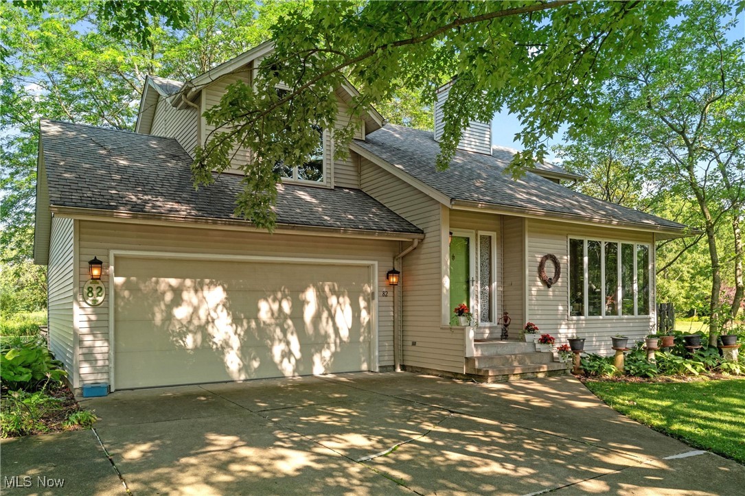Why wait to build when you can own this move-in ready, custom-built home on a serene, almost half-acre site, offering you modern features and comforts? Built in 1992 by reputable local contractors Clark Brothers Construction, this quality residence offers over 1,700 sq ft of total finished living space, with a well-thought-out floor plan. Vaulted ceilings create an airy, spacious feel, complemented by an open staircase and upstairs hallway overlooking the downstairs living. Extra tall windows and transoms maximize natural light and ventilation, with the deciduous trees outside providing summer shade and winter sun. Easily accessed from the dining room, is a custom-designed, two-level deck featuring built-in seating, a pergola and a trellis, perfect for quiet outdoor dining or entertaining outside while enjoying sunsets. The fully equipped kitchen has plenty of countertops and cabinetry, stainless steel appliances, and view of the rear garden. The primary bedroom has a seating/desk area, an en-suite bath with a walk-in closet and a walk-in shower. Bamboo floors throughout and nature stone floor in the basement promote indoor air quality, beauty, low-maintenance and durability. A brand-new high end all-electric two-zone heat pump system (with whole house air-purification system) provides energy-efficient heating and cooling and lowers your carbon footprint and utility bills! An attached 2-car garage with overhead storage has direct access to the backyard and the hallway by the kitchen. The rear garden is professionally landscaped and verdant with established flowering perennials and mature trees. With easy access to the bike path, nature trails and golf course and within biking distance to Oberlin downtown and campus, this home is a must-see – schedule your virtual or in-person tour today!