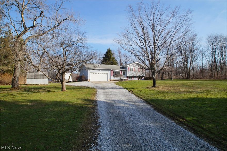 Beautiful & move in ready describes this updated 3 Bedroom 2 Full Bath Split level home setback on a private park like setting. Featuring a spacious family room boasting a cozy wood burning fireplace and overlooking wooded views. Open and bright living room with Cathedral ceiling and bay window opens to the Eat in 
kitchen with gorgeous cabinets offering plentiful storage. Large second family or recreation room on the lower level featuring a full bath. Enjoy the privacy and nature from deck which leads from the family room. Fantastic location, Super clean and a must see!