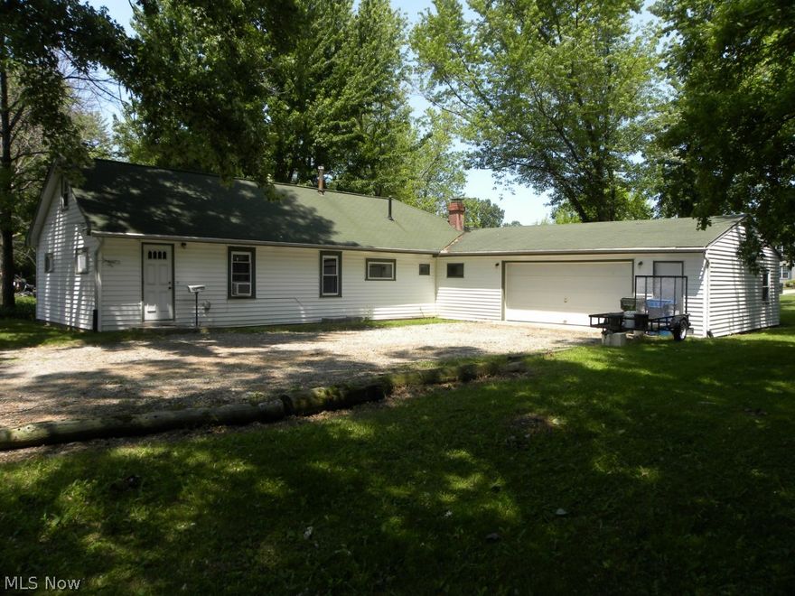 Close to Lake Erie. A little updating could really bring the charm back to this home. Huge Family room addition with wood burning fireplace. There are 4 lots with this property which give you almost 3/4 of an acre lot!  Updated electrical box, 2 furnaces. Oversized 2 car garage with plenty of storage room. Priced to sell quick! Great buy for an investor!!!  Lots of Potential!  County Market value is 72,060 for all 4 parcels.