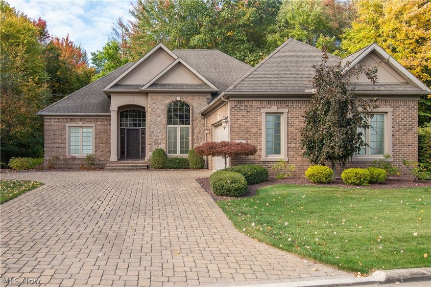 Absolutely STUNNING 4 Bedroom/3 Full Bath, Brick & Stone RANCH Villa with Private Backyard.  Villa Features Include:  HUGE Great Room with Gas Fireplace, AWESOME Open Kitchen with Custom Cabinets, Granite Counter Tops AND Back Splash, Superior Stainless Steel Appliances, Ceramic Tile Flooring, & Large Breakfast Area, Formal Dining Room with SPECTACULAR 5 Star Thick Crown Molding, First Floor Laundry Room, Half Bath, & Tons of Closet Space.  The First Floor also offers a Spacious Master Bedroom with MAGNIFICENT Master Bath with Floor to Ceiling Tile Shower, Separate Jacuzzi, Granite Counter Tops, & Large Walk In Closet.  There are two other large bedrooms & 2nd Full Bath with Granite Counter Top.  The Lower Level offers a MASSIVE Great Room, Extra Dry Storage Area, and 4th Large Bedroom with 3rd Full Bath.  The Back Sun Room leads to a Back Brick Patio with showcases the UNBELIEVABLY Private Scenic Backyard.  NEUTRAL PALETTE COLORS OFFERS A BLANK CANVAS AND TIMELESS DESIGN!