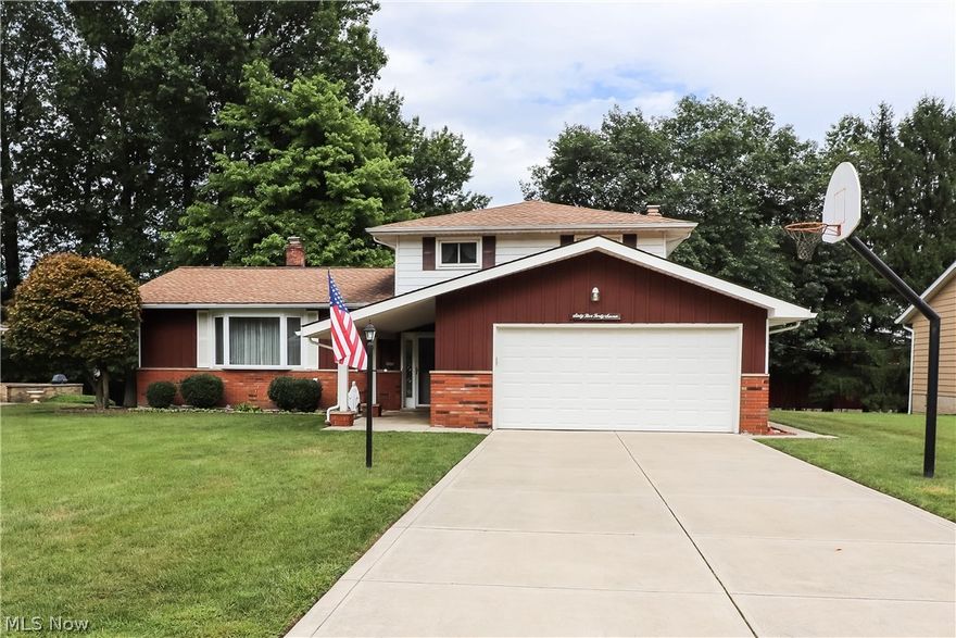 Very well cared for 4bedroom 2 bath split level on a quiet, dead-end road. This home offers a large open eat in kitchen with all newer cabinets and countertops, sliding patio doors onto the back deck, and all kitchen appliances. Gas fireplace in living room, with sliding doors to patio off the living room. Kitchen level contains living room and dining room which both have beautiful hardwood floors. The third level is where 3bedrooms all continue with the hardwood floors. Full bath is jack-and-jill off the hallway to the master bedroom. All of the hardwood floors have been restored and refinished. Attached 2 car garage with man door out the back, and chain link fence around the back yard.  Patio of the living room has pavers and steps up to the deck off the kitchen. So much to list - this is a must see and will sell fast. Close to shopping, restaurants, schools, and freeways.