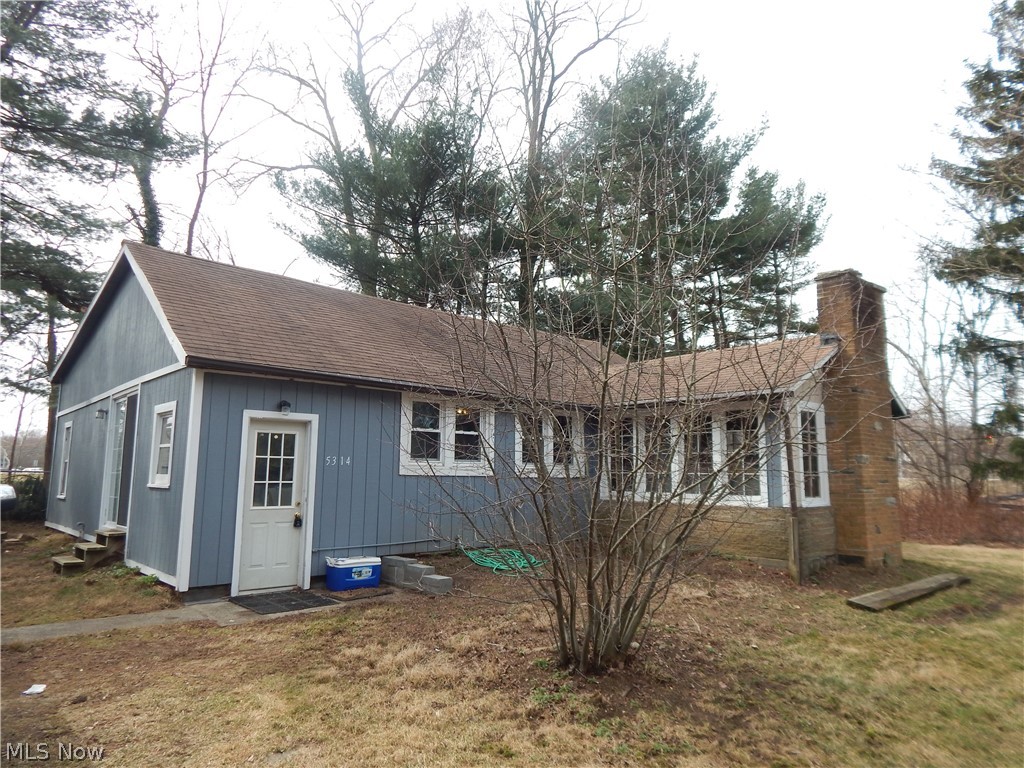 Come home to country private living in the city. This home features spacious kitchen, living room and 3 Bedroom. There is an easment from SR 43 to approach property. approx. 360 deep wooded lot. Runs along Rt. 261 at Rt. 43. Two car DT garage. Basement and much more.