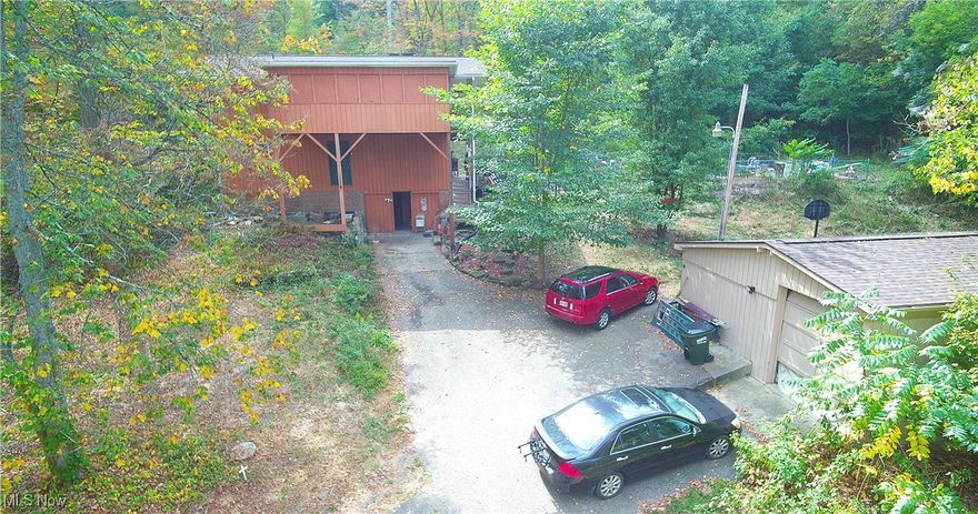 MOTIVATED SELLER Discover the possibilities with this Dellroy property, offering space, privacy, and potential. Situated on 4.96 acres, this home combines open land with a functional layout, making it an excellent option for anyone seeking both country living and room to grow.

Highlights include a newer roof, detached 2-car garage, and a refreshing inground pool, ideal for summer enjoyment. The home itself needs some TLC, giving you the opportunity to update and customize it to your taste. With its strong foundation and generous acreage, it's a blank canvas ready for your vision.

Located just minutes from Atwood Lake, this property is perfect for those who love outdoor recreation while still being close to everyday amenities. Whether you're dreaming of a homestead, a weekend getaway, or a value-add investment, this home has plenty of potential to become something special.

Schedule your showing today and see the opportunity this 4.96-acre property has to offer!
