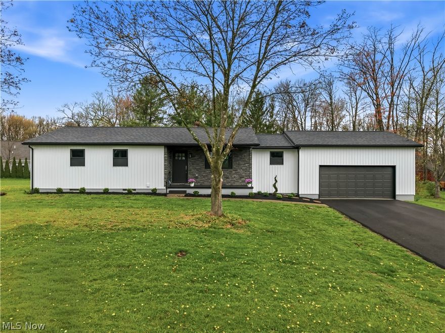 Basically Brand New – Completely Updated with Style & Quality!  This stunning home has been fully renovated from top to bottom, offering the feel of new construction with quality craftsmanship, trendy fixtures, and exceptional attention to detail throughout. Located in a desirable area with great curb appeal, this one is truly move-in ready!  Step inside to a bright open floor plan featuring a spacious great room with an attractive brick woodburning fireplace — the perfect centerpiece for cozy gatherings. The gorgeous kitchen is a showstopper, complete with granite countertops, breakfast bar, new cabinetry, and brand-new stainless steel appliances.  Convenience meets function with first-floor laundry and three generously sized bedrooms. The home offers a full bath with tub/shower combo plus a private master bath with a shower stall.  The finished basement adds incredible living space, featuring a huge rec room, half bath, and plenty of storage — ideal for entertaining, a home gym, or media room.  Recent updates include new vinyl siding, windows, flooring, paint, deck, driveway, and so much more — giving you peace of mind for years to come.  This home truly has it all — modern updates, space, style, and location.  Don’t miss your chance to own this like-new beauty — schedule your private showing today!