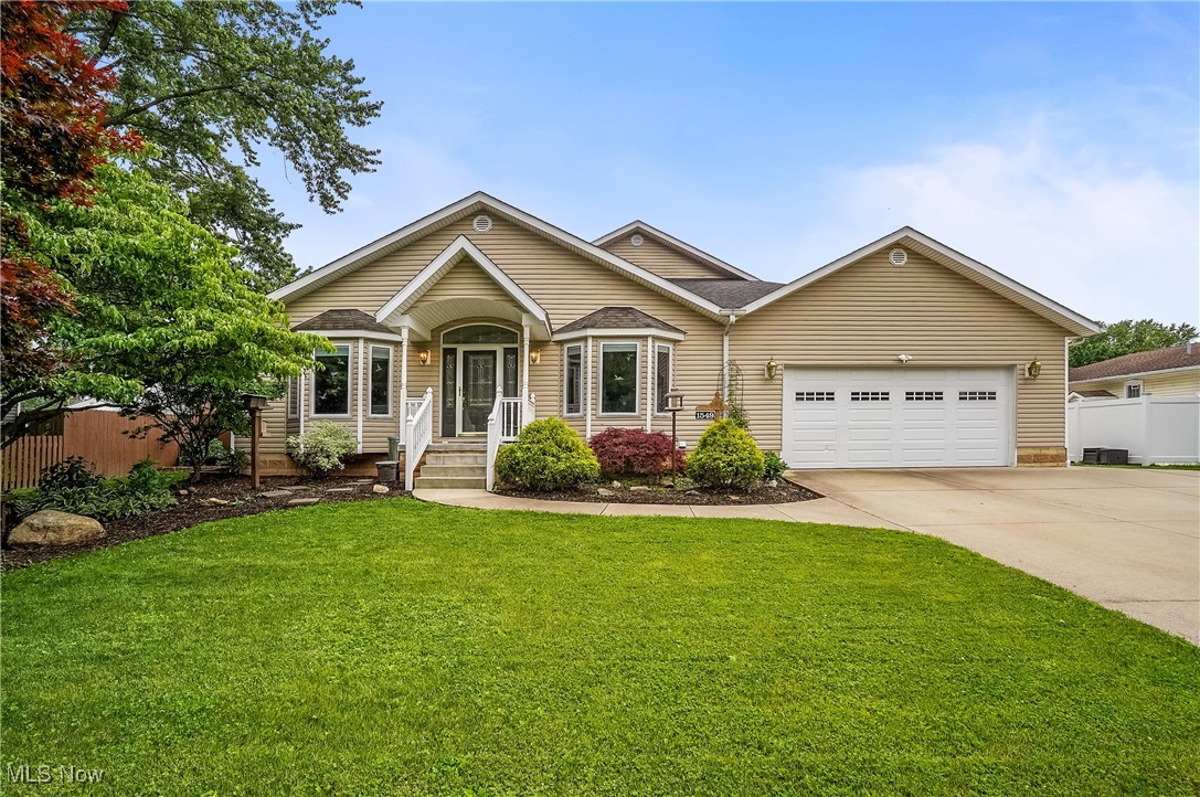 Unique opportunity! This 2009 custom-built Ranch can be used as a single-family residence or a legal 2-family home, providing versatility and flexibility for potential buyers in Suffield Township! Every detail of this home was expertly crafted! The first floor has a gorgeous, open floor plan with cathedral ceilings and a high-end custom Kitchen. The Kitchen opens to an informal dining or seating area, Great Room, and a formal Dining Room with sliders to a fabulous covered deck. The Kitchen features quartz countertops, custom-built cabinetry, two sinks, an induction stove top with a pot filler, double ovens, and a huge island with a breakfast bar. Top of the line construction materials throughout, including windows with integrated blinds and pull-down screens, solid wood doors and trim. The Master Bedroom is massive, featuring two closets and an exit to the covered porch. Two other large bedrooms with luxury Pergo flooring complete the first floor. The impressive walkout basement (or legal second unit) can be accessed from outside, or from upstairs. It includes two large bedrooms, each with walk-in closets, a large Living Room featuring a ventless fireplace, full Bathroom, a beautiful modern Kitchen, Dining Room, Rec Room with a wet bar, and additional storage. Plumbing is also available for an additional bathroom, making it even more convenient and functional. The garage is oversized and includes a workshop, built-in storage, and a half bath. The garage also includes its own furnace and central air for year-round comfort. There are several 220 outlets perfect for whatever project you wish to tackle! Other features of the home include an 80-gallon hot water tank and a fully fenced private yard with access gates for lawn care and a storage shed. The side of the deck is graveled and is currently used as non-muddy space for dogs. Too many details to mention, you do not want to miss this one!