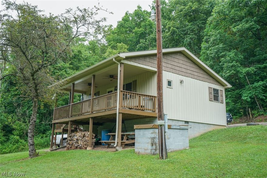 The perfect getaway cabin for sale in Washington County, Ohio. This cabin is just perfect and has so much to offer. Secluded and private, located along the Little Muskingum River and close to Wayne National Forest. Fishing, hunting, or just looking to get away then you need to come see this property. Don't miss this one. Call Today!