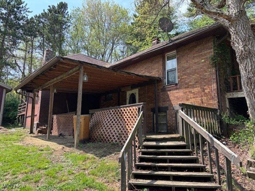 Here's a great opportunity to make this property your own. Home will require work. House is heated by a wood burner. Property is selling AS-IS. Nice size lot with an over-sized 24 x 24 metal sided pole barn built in 2012 has cement floors and wired with 200 amp service. Public water.  New septic. Roof @ 7 years old. Includes a 2015 swimming pool  Shared driveway.  The 8 x 10 shed encroaches the neighboring lot. It will be moved.  Includes 2 parcels.