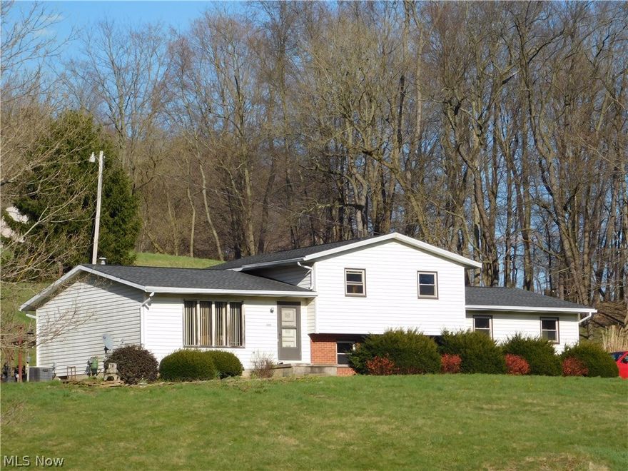 Located only minutes from Millersburg this 3 bedroom home sits on almost 12 acres. The split level home features 3 bedrooms,1 1/2 baths, kitchen, living room and office area. The home has a newer roof and most of the windows have been replaced. The 1/2 bath is plumbed for a shower stall. The acreage consists of woods, tillable acreage, hillside, and the homesite. Storage shed and chicken coop will not transfer with property.Driveway easement for oil and gas well on neighboring property.