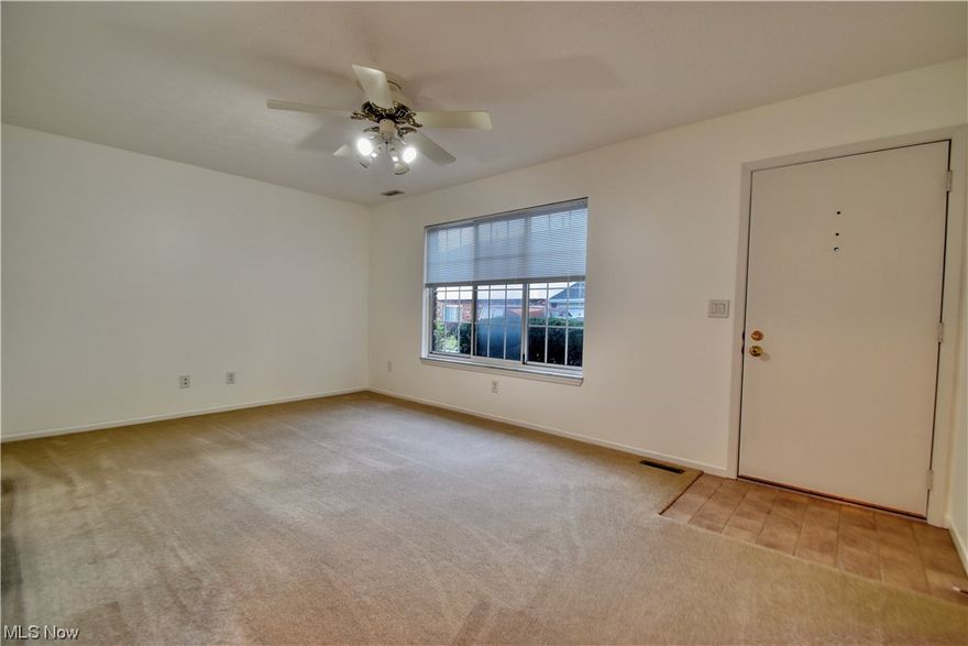 All meticulously maintained and updated Mentor 2 bedroom 1 1/2 bath End Unit Condo in Hartlawn Condo's near Station St and Hart Rd awaits the buyer who is ready to move now. Enjoy a carefree lifestyle and private rear fenced in yard, patio with Trellis. Owner says condo never had pets or smokers occupy and has real hardwood floors in kitchen and dining area, ceramic tile in both baths laundry. Cooks will love the remodeled kitchen from a galley type to open style that includes all appliances: stove, refrigerator, microwave ('17), Shrock cabinets and washer/dryer also included. Very spacious bedrooms and neutral decor throughout. Furnace and central air all recently maintained and newer hotwater tank and window screens ('17). Drop down steps up to attic and features extra  R55 insulation('17) for energy efficiently. Convenient attached garage w/door opener and newer roof and gutters ('23). Don't miss this Great Value!