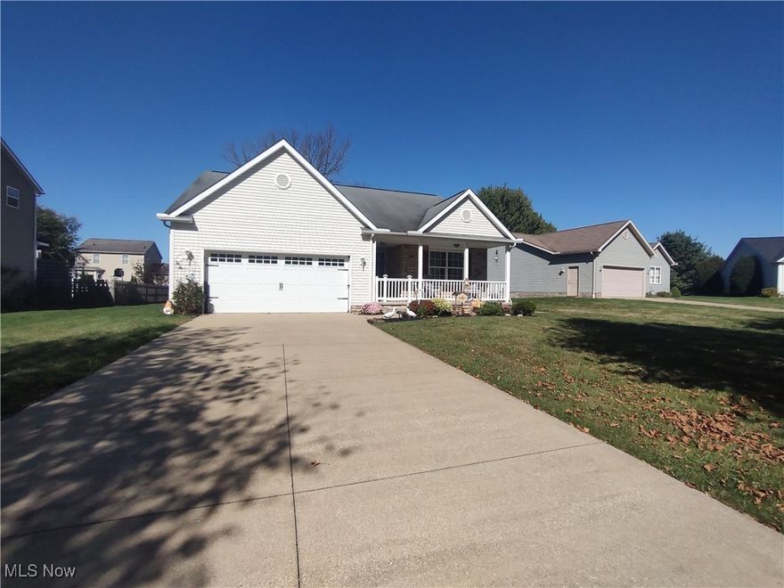 Located in Annevar Estates, this well-maintained ranch home offers an excellent opportunity for homeowners seeking practical single-level living. This three-bedroom, two-bathroom home spans 1,462 square feet of thoughtfully designed living space, where every detail has been carefully planned to create a comfortable and functional environment. Upon entering through the welcoming front porch entrance, visitors immediately notice the home's open design. Vaulted ceilings grace the living room, dining room, and kitchen, creating an spacious feeling that makes daily activities more enjoyable. The entire interior features brand-new lighting fixtures, providing bright, welcoming illumination throughout each room. The heart of this practical home lies in its well-designed kitchen, where cooking enthusiasts will discover efficient layout and functionality. Adjacent to the kitchen, a conveniently located first-floor laundry room features a large pantry cabinet, ensuring that daily tasks are handled with ease and storage needs are met. The residence's three bedrooms provide comfortable sleeping areas, while two full bathrooms offer convenience for busy households. The ranch-style layout places all bedrooms and main living areas on the first floor, eliminating the need for stairs in daily living and making the home accessible for all family members and guests. The full basement presents excellent possibilities—currently offering abundant storage solutions while maintaining tremendous potential for future finished living space, allowing for expansion as needs change. Outdoor living is enhanced by the completely fenced backyard, where a deck transitions to a concrete patio area, creating an ideal setting for family gatherings and entertaining. The attached two-car garage, featuring a brand-new door, provides secure parking and additional storage space. Located minutes from Kent State, NEOUCOM, shopping, dining, and interstates 76, 77, Routes 14, 480, 44,5.