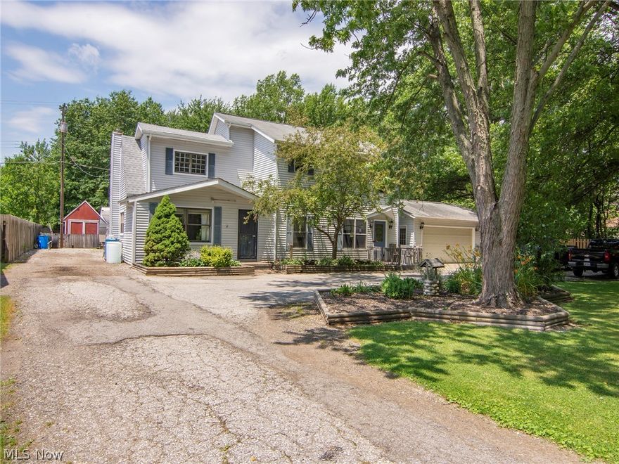 Welcome home to this unique one of a kind home in Olmsted Township! Walk in the front door and you will see an enormous family room for gathering to watch movies with the built in Bose surround sound! The eat in kitchen is unique with hand carved wood cabinets, brand new stainless steel appliances, large pantry, and a window that overlooks the beautiful backyard! If you are looking for first floor living this house has a great sized main floor bedroom, laundry, and full bathroom! The main floor bathroom has a large jacuzzi tub/shower! There is a second living room that you can use for anything you can imagine; sitting room, playroom, gym, rec area, the possibilities are endless. Upstairs you will find 2 more bedrooms and a Bonus area currently being used as an office. The master bedroom is unforgettable; extremely spacious, with a giant walk through closet and a master glamour bath! After a long day enjoy a relaxing evening in the large corner jacuzzi tub inlaid in marble. This 3/4 acr