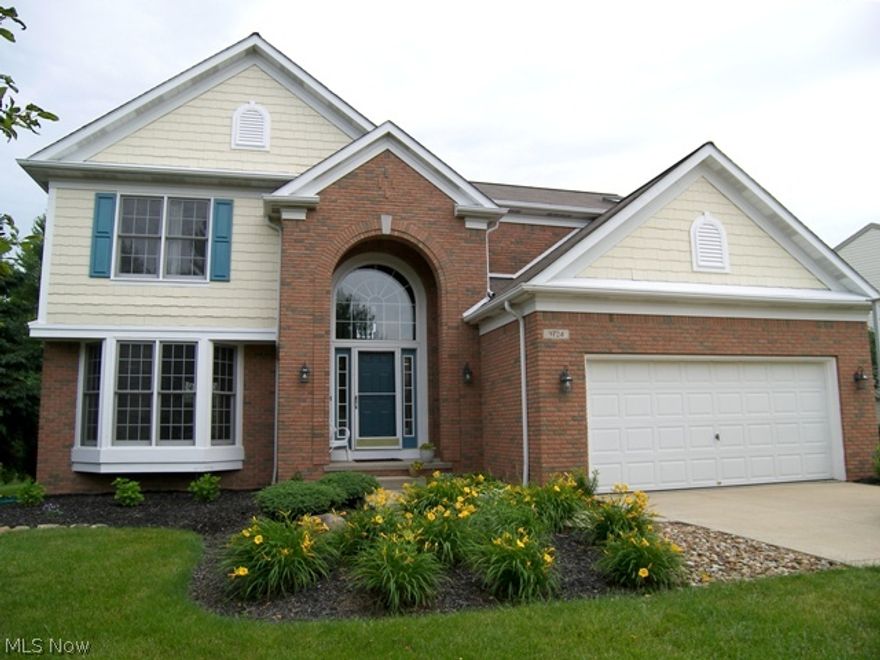 Very pretty brick front transitional in The Meadows.  As you walk in, you are greeted by the spacious two story foyer with wood flooring that opens to the living room and dining room with a bay window.  Plenty of space for entertaining in the kitchen with a center island, laminate tile and stainless steel appliances upgraded May 2014 to include refrigerator, range, dishwasher and microwave. The eating area has doors leading to the stampcrete patio and wonderful backyard with plenty of room to play. Open from the spacious kitchen is the family room with a gas fireplace.  All bedrooms are on the second floor with the master bedroom featuring a vaulted ceiling, wood laminate flooring, walk in closet and glamour bath with double vanities, a whirlpool tub and separate shower. The other three bedrooms and full bath are generously sized. The laundry is on the second floor. There is a finished lower level with a recreation room, a full bath and another room perfect for an office or craft room.