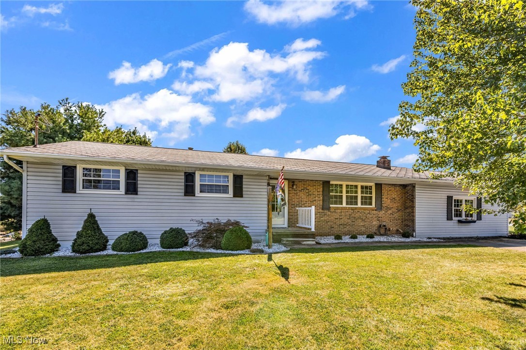 Welcome to this beautifully updated 3 bedroom, 1.5 bathroom ranch on a spacious 0.6084 acre lot! The updated, eat-in kitchen features brand new granite countertops and plenty of cupboard space plus a bonus pantry or coffee bar area. Enjoy a huge family room with a cozy gas log fireplace. The primary bedroom offers its own half bath. The full bathroom has been updated with a stylish tile shower. Convenient main floor laundry adds everyday ease. Outside, enjoy a large yard and a deck with a pergola as well as a second concrete driveway offering plenty of room for parking or space for a boat or RV. A newer 12' x 16' shed provides extra storage. New furnace and A/C (2022) and new 200-amp service. With modern updates, ample storage, and inviting indoor and outdoor spaces, this home is move-in ready!
