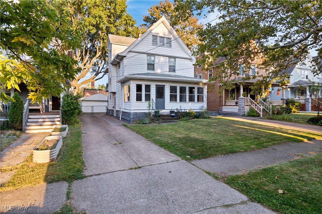 Welcome to 1477 West 116th Street! This charming home offers 3 bedrooms and 1.5 bathrooms. As you enter, you are welcomed by a large enclosed porch that leads into the main living areas. The dining room flows seamlessly into the kitchen, while a convenient half bath completes the first floor. Upstairs, you’ll find the primary bedroom, two additional bedrooms, a full bath, and access to the third-floor attic. The unfinished basement provides plenty of storage space along with laundry and utility areas. Outside, enjoy a fenced-in backyard with plenty of green space and a 2-car garage. Schedule your showing today!