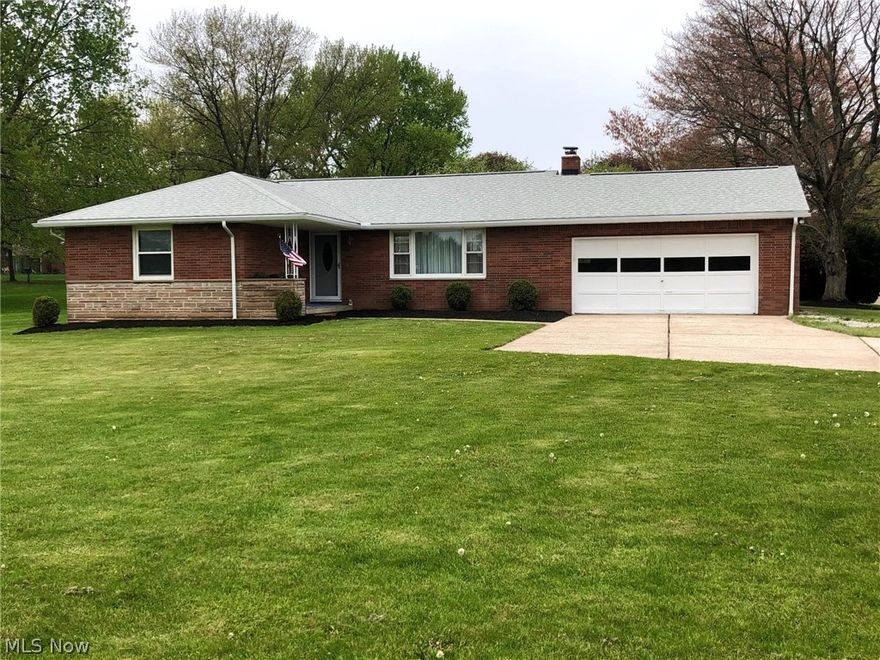 Fantastic Plain Twp. ranch that is Move In Ready ! This very clean home features three bedrooms with beautiful hardwood floors, large double door closets for plenty of storage, brand new totally updated bathroom, tub shower, vanity,fixtures, lighting, and flooring. As you enter through the newer front door, the living room has a built in cabinet, attractive hardwood floor and an open concept to view the dining and kitchen area. The kitchen has newer appliances and plenty of cabinet space. The lower level has a brick fireplace! There are newer vinyl windows, and newer roof (2017) that highlight the brick exterior. Low maintenance for this home. The entire interior has been freshly painted and all new lighting fixtures installed! Also, the furnace, central air, and water heater were newly installed in 2020. There is an attached 2-car garage for easy access.
You can enjoy the view of the lovely rear yard from the covered rear porch.!  Don't hesitate, call for an appointment to view.