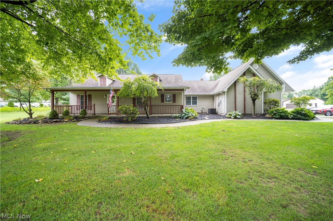 Looking for a one floor living home? This magnificent ranch packed with features on a double corner lot is ready for its new owner. A beautifully landscaped path invites you in to this 3 bedroom, 2.5 bath home. The classic eat-in kitchen opens into the living room that boasts a cathedral ceiling and gas fireplace. The master bedroom features large closets and full bath. The 2 car attached garage has a separate workshop and includes cable tv hook up and phone. You will find extra storage above the garage and the 12x16 storage shed with cement floor and electricity for your convenience. No basement, this is on a slab. Roof installed in 2008. Central air conditioning added in August, 2009. Check out this backyard with a multi-level deck and above ground pool (all chemicals stay). Plenty of storage in the attic and closet spaces.