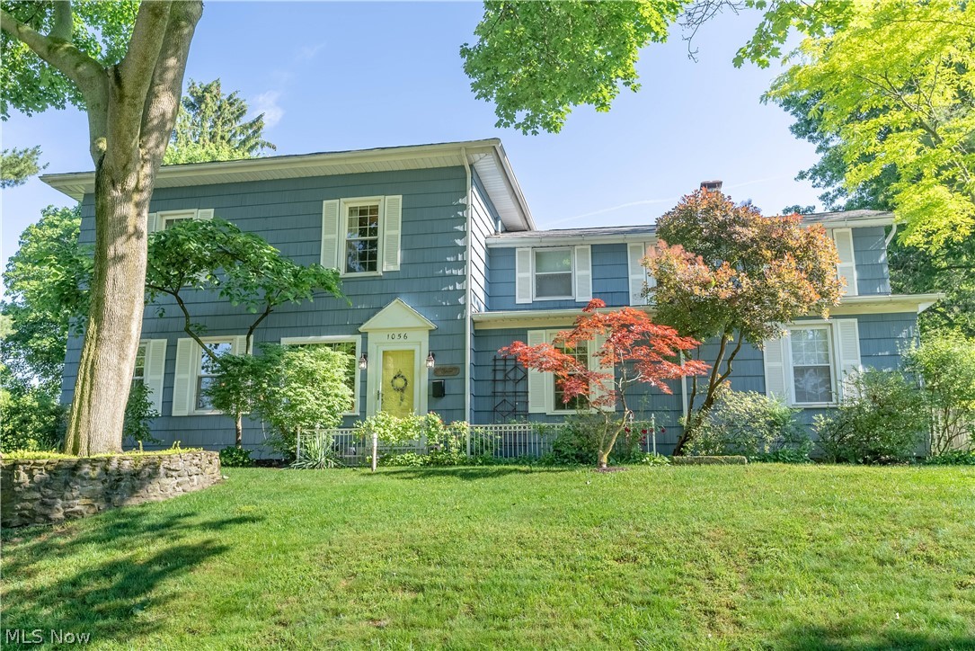 Beautiful and impeccably kept century home in an outstanding Jackson Township location. You’ll find so much character in this lovely home that has been carefully remodeled and renovated over the years to maintain the charm of its original state. You’ll appreciate the lovely hardwood floors, high ceilings and amazing three-tiered deck/covered back porch overlooking the peaceful and private backyard. Traditional spaces on the first floor include living room with fireplace, family room, a spacious dining room and large remodeled kitchen with solid surface counters and subway tile (2016). You’ll also find a first floor laundry and remodeled full bath (2016). Upstairs you will find 5 nice-sized bedrooms, a sitting room/office with loads of storage/built-ins and a newly remodeled full bath (2022). The lower level adds more storage, access to the rear load garage/walkout for added privacy and convenience. Other recent updates and features include: New roof (2021); repainted cedar exterior (20