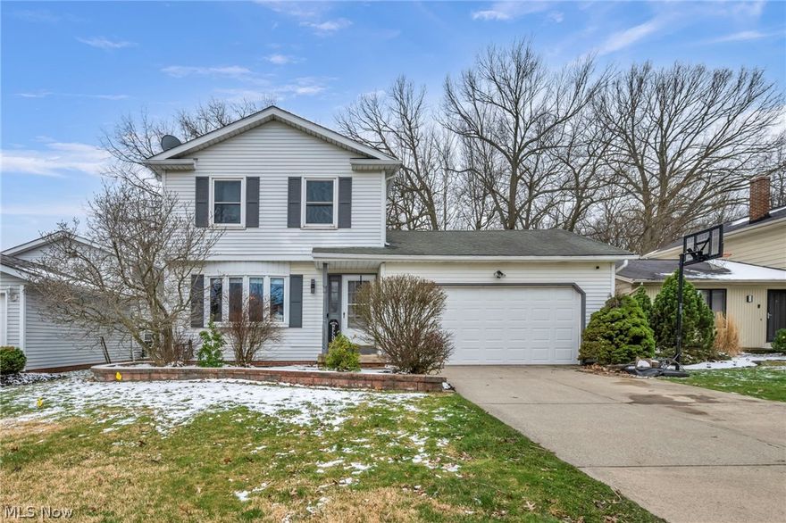 This beautifully updated 3-bedroom, 3-bathroom home in Garfield Heights, Ohio delivers over 2,000 square feet of finished living space on a quiet, tree-lined side street in one of Cuyahoga County's most serene and well-maintained neighborhoods. Sidewalks and street lights throughout the area make this a safe, walkable community that buyers in the greater Cleveland area consistently love.

The updated kitchen is a true standout, featuring rich granite countertops and modern finishes that bring both style and everyday function together. Whether cooking for the family or entertaining guests, the space delivers. Three full bathrooms and a flexible, spacious floor plan provide the comfort and convenience that first-time buyers, growing families, and Northeast Ohio investors are actively searching for.

The outdoor space is where this home truly shines. A large deck off the back of the home is ideal for warm-weather entertaining and relaxing evenings outside. The fully fenced yard offers privacy and security, and the property backs directly up to peaceful, natural woods. That wooded backdrop is a rare and highly desirable feature that gives this home a quiet, retreat-like feel you simply cannot find everywhere. The attached 2-car garage adds year-round convenience and additional storage space.

Well maintained inside and out, this move-in ready Garfield Heights home is a standout value in today's Northeast Ohio real estate market. Schedule your private showing today.