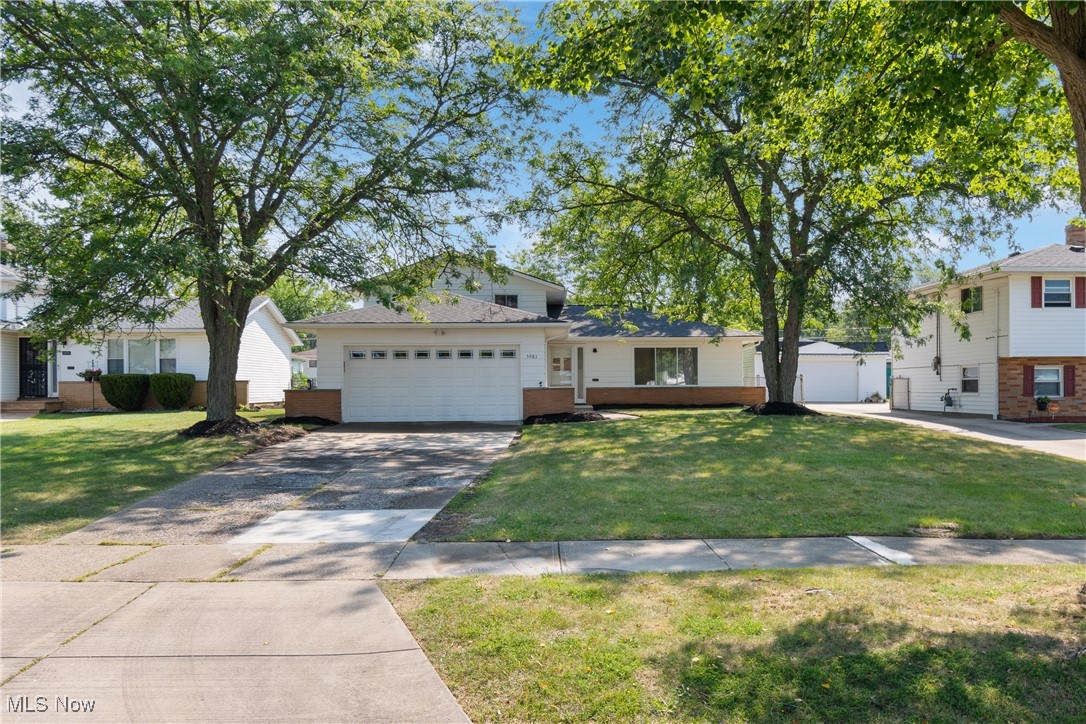 Fully Renovated Split-Level with Resort-Style Comfort!
Welcome to this stunning 3–4 bedroom, 2 full bath home offering 1,760 sq. ft. of beautifully redesigned living space in a picturesque Bedford Heights neighborhood. Every inch has been thoughtfully updated including a new roof, windows, flooring, LED lighting, and more, creating a move-in ready home with a modern, spa-like vibe.
Step inside to an open floor plan where the living and dining rooms flow seamlessly into the chef’s kitchen, featuring new cabinets, Corian waterfall countertops, stainless steel appliances, floating shelves, pendant lighting, and seating for three at the breakfast bar. The main level’s cove lighting sets a warm, resort-style ambiance, while the lower-level family room boasts a custom accent wall, built-in shelving, and fireplace.
Upstairs, you’ll find three spacious bedrooms and a fully renovated bath with Bluetooth-enabled LED light vent fan, heated LED mirror, porcelain tile surround, marble-top vanity, and dual rain + handheld showerhead. The flexible lower-level bedroom/office has its own spa-like bathroom with matching upgrades.
The spacious laundry room includes a farmhouse hall tree, integrated sink, and ample cabinetry. Outdoors, enjoy a fenced backyard, paver walkway, and inviting patio, perfect for entertaining. The garage features an epoxy-coated floor for a polished finish.
Located in a community of well-maintained homes, this property offers style, comfort, and functionality. All major systems are updated, ensuring peace of mind for years to come.
This is more than a home, it’s a lifestyle. Schedule your showing today!