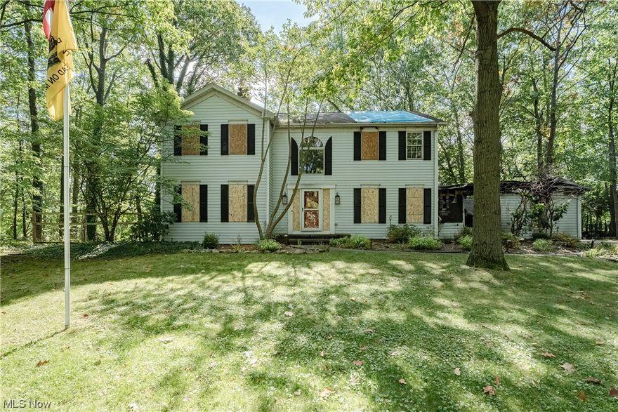 Partial fire-damaged home - Garage fire being sold AS IS. After Repair Value (ARV) ranges from $400,000 - $425,000 when finished. This is an amazing opportunity to bring your vision to reality. 4 BD, 2.5 BA, 2,896 sqft plus basement. Lot Size: 1.40 Acres with mature trees.