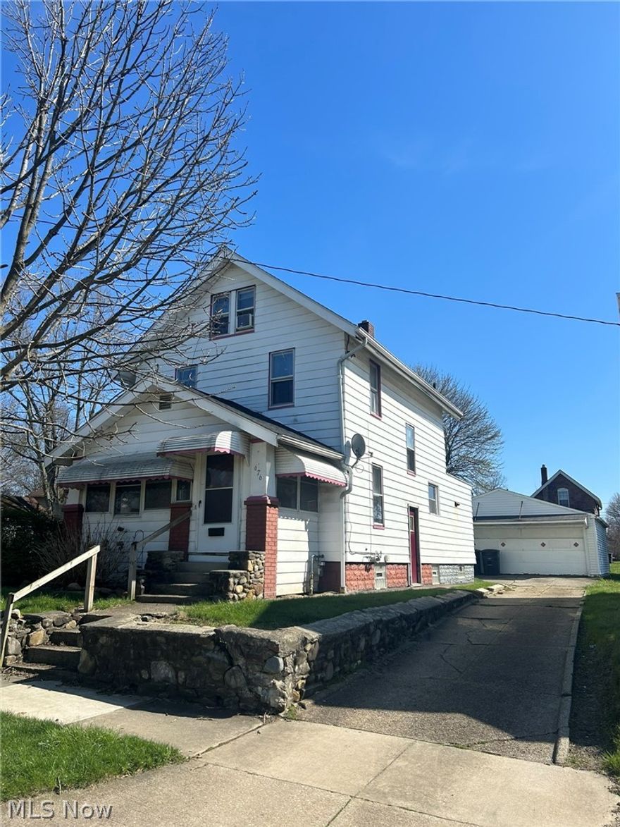 Opportunity meets value in this spacious 3-bedroom Colonial home, set on a rare triple-lot parcel-perfect for investors or buyers ready to stop renting and start building equity. With room to grow both inside and out, this property offers flexibility, functionality, and long-term potential.

Relax on the enclosed front porch before stepping into a bright living room filled with natural light and beautiful hardwood floors that flow seamlessly into the formal dining room, complete with built-in storage and a charming bay window. The oversized kitchen is equipped for everyday living with a counter cooktop, wall oven, dishwasher and disposal, plus an additional eat-in area with durable vinyl flooring-ideal for casual meals or morning coffee.

Upstairs, three bedrooms have been updated with stylish vinyl plank flooring, while the full bath features a vanity sink and bathtub. The finished attic expands your living space with a large fourth bedroom, complete with closet and cozy carpeting-perfect for a private retreat, office, or guest room.

The partially finished basement offers even more flexible space, along with a laundry area that includes a utility sink and electric dryer hookup.

Outside, enjoy the extra room that three lots provide...a rare find in the city, offering endless possibilities for outdoor living. The 2.5-car garage with opener and electricity adds convenience and versatility. A new roof (2024) and newer furnace add peace of mind and value. Whether you're looking to invest, expand your portfolio, or finally own instead of rent, this property delivers space, opportunity, and long-term upside all in one!