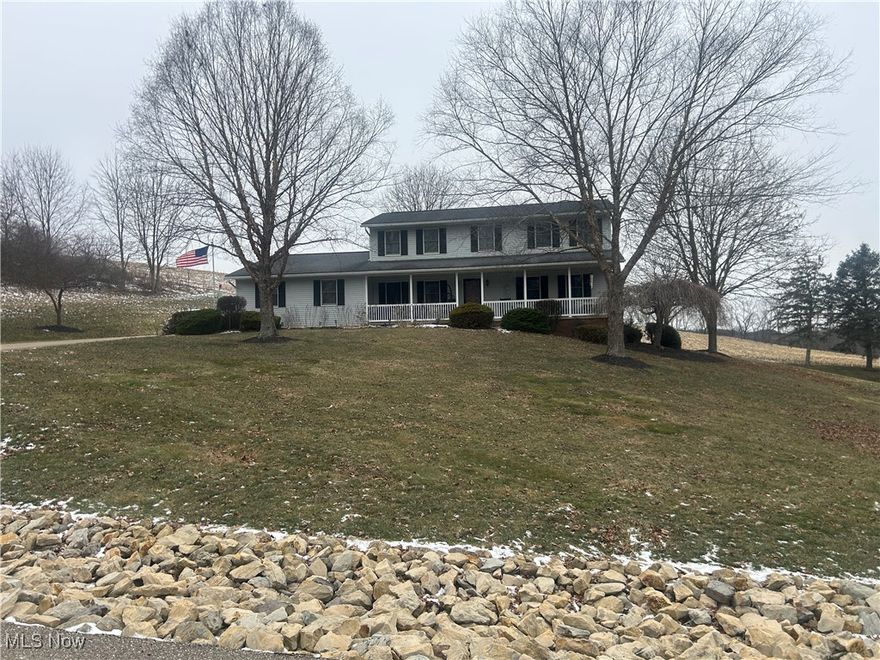 Welcome to this spacious two-story home in Dover, Ohio, ideally located on an oversized 0.60-acre lot with picturesque rolling farm field views. Positioned at the edge of town in the highly desirable Dover School District, this property offers privacy, space, and convenience.

This home features 5 bedrooms and 2.5 bathrooms with a thoughtfully designed first floor that includes two separate living rooms and a formal dining room, providing ample space for entertaining, gatherings, or flexible everyday living. First-floor laundry and a half bath are conveniently located just off the garage and kitchen.

Numerous updates have been completed within the past five years. New furnace and a high-end, ultra-quiet, state-of-the-art air conditioning unit, both only 6 months old! The upper level offers new laminate flooring throughout all bedrooms, while LVT flooring enhances the kitchen and primary bathroom.

The finished basement includes a 5th bedroom, drywall already in place, and a roughed-in media wall designed for an 80inch TV and future fireplace ideal for a media room or private retreat. The basement also features plumbing hookups for a future third full bathroom.

Additional improvements include a new well pump installed four years ago, an impressive $15,000 water softener/personal water treatment system, and an outdoor generator already installed with a dedicated hookup to the home, offering added peace of mind during power outages.

With generous living space, scenic views, and thoughtful updates throughout, this home is a rare opportunity in a prime Dover location.