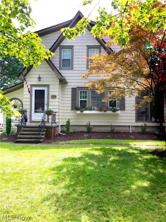 Open the door and you'll want to stay!!!!! Enjoy this well maintained home which offers plenty of natural light through out.The entry way will greet family and friend with warmth and love.And the cozy fire placed living room Says "Welcome Home" The spacious but intimate dining room can accommodate 2 or 12. As you enter the kitchen it will offer a functional balance of comfort and convenience, as well as a nice sized eating area and newer kitchen floor. We are sure that you will be pleased with the size of each bedroom. Both full baths have been nicely updated. The lower level Rec. room/play center will keep the rest of the home nice and clean. This home also offers a large deck off of the kitchen and an enclosed porch directly off the living room. The basement has been water proofed. undated windows come with custom made blinds through the house. Square footage does not include lower level rec. room. Seller to exclude all draperies! Please put this on your A list of homes to preview!!