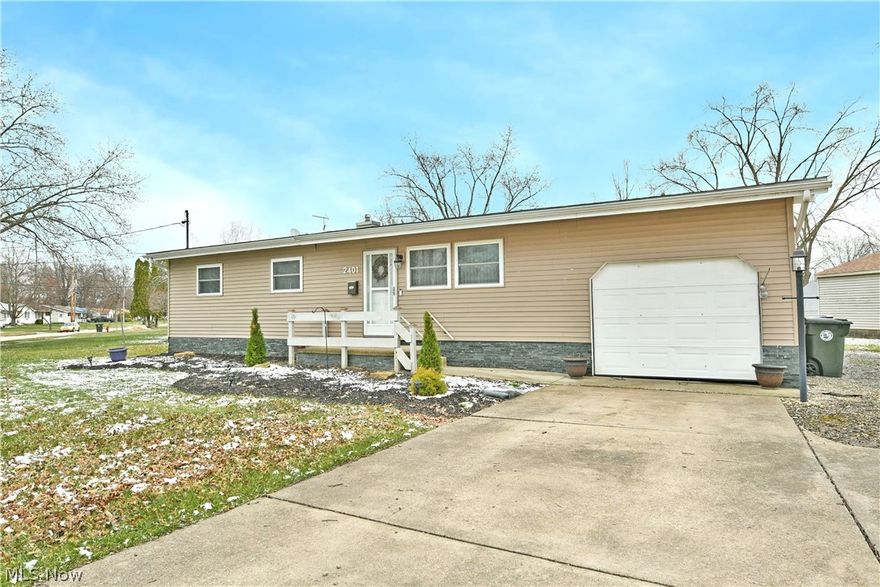 Find beauty in simplicity as you immerse yourself in the tasteful updates and perfectly cozy living space found within this darling Warren ranch! Serving up an attractive, three-bedroom layout plus a full basement, this one has potential and more. Residing in a quiet neighborhood, the property spans a sweeping curve to create a unique lot with plenty of frontage; easily showcasing its cement driveway and landscaped entryway. Behind the single car garage, a freshly poured patio joins a raised and picket lined rear deck; all overlooking a large storage shed. Step inside to find a welcoming living room, beckoning you closer with its soft, naturally lit surroundings and built in cabinets. Hardwood styled flooring runs underfoot as it continues into the nearby combined kitchen and dining spaces. Stainless steel appliances join stone-look counters and a glass tiled backsplash as the modern cabinets complete the updates. Down the hall, a brightly lit full bath delights with its elegantly tiled shower and sleek vanity. The trio of bedrooms offer surprisingly spacious quarters, carpeted flooring and personal closet space. Downstairs, a partially finished basement allots for storage or rec space, laundry services and an attractive bonus room.