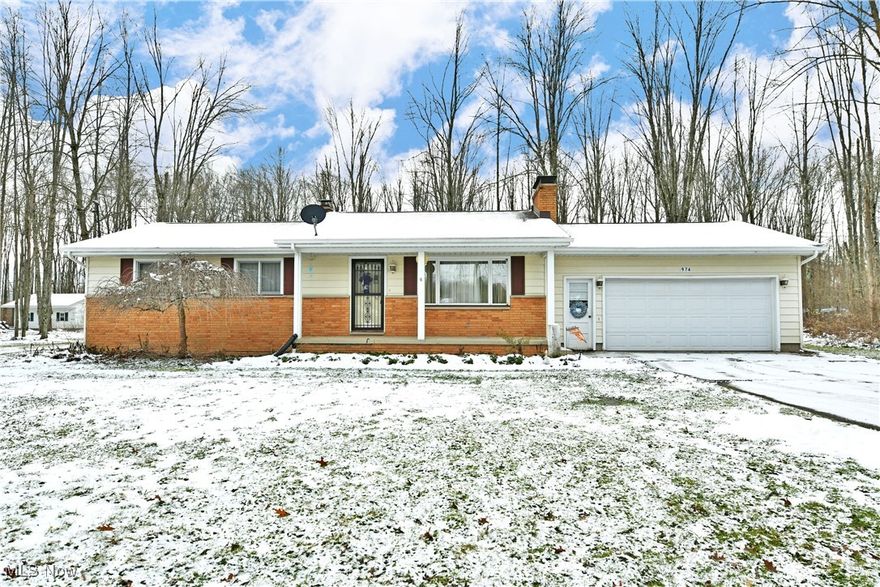 You won’t have to take a trip to the North Pole to find what you’ve been searching for this 
year; it’s all right here in Bazetta, wrapped up in a desirable ranch package! Welcome 
home to this darling property, offering nearly two acres of potential packed land that 
includes a large storage shed. Tall trees provide natural privacy as the frontage showcases 
its warm, brick accents and covered front patio. Step inside to find a move-in-ready, three bedroom layout that begins with a spacious living room and its stone trimmed fireplace, 
ready to warm you back up on those cold, snowy nights. The impressive kitchen and 
central dining rooms are located just steps away, delighting with perfect backyard views. 
Long running countertops join the dark stained cabinetry within the galley layout, brimming 
with plenty of overhead lighting. Down the main hall, a robust full bath provides neat tile 
work and a sizeable, mirrored vanity. The trio of bedrooms each reveals hardwood flooring 
with matching trim and ample closet space to complete the floor. Down below, a full 
basement includes a lower fireplace, laundry, utilities, and bonus storage space. Call today for your private showing!