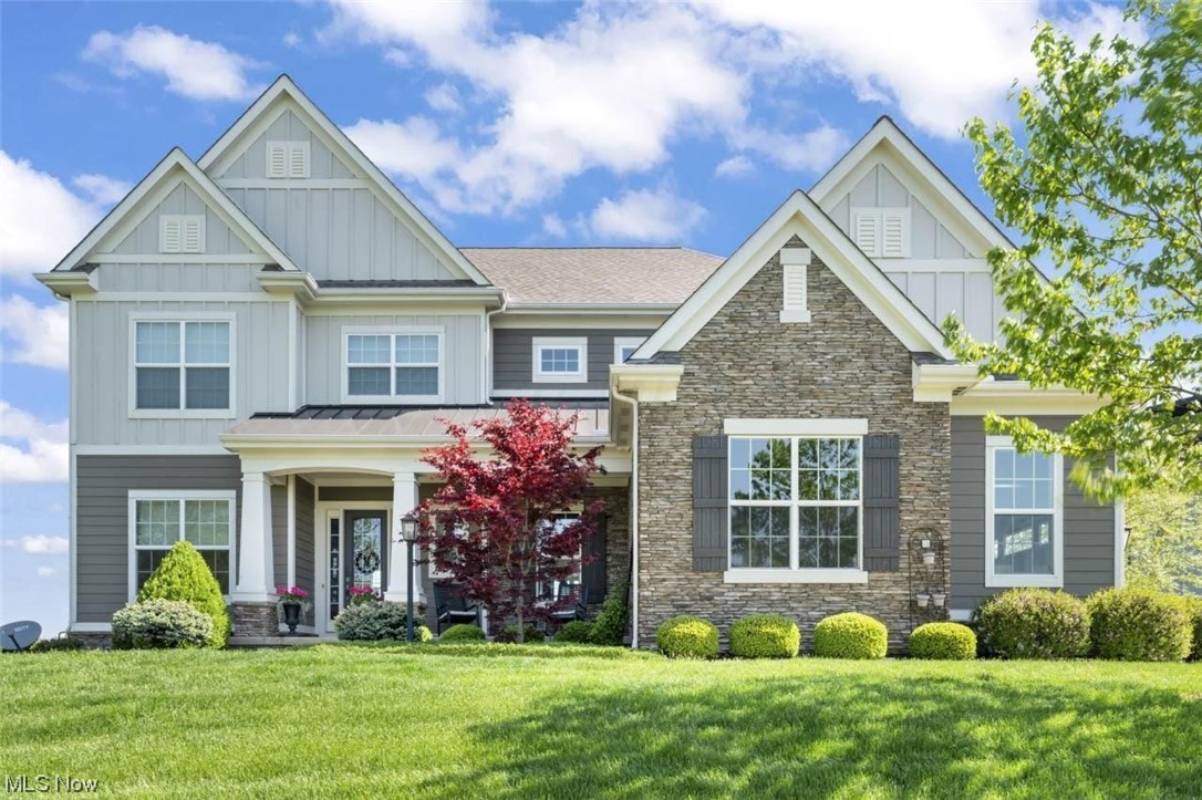 This stunningly beautiful custom built home offers an impressive sweeping view and an incredible inground pool with a gorgeous resort-style patio and hot tub. The Chef's Kitchen is a delight with it's extra large island, exquisite granite counter tops, and top-of-the-line appliances. Throughout the home, you'll find true craftsmanship, including custom built-ins, gorgeous woodwork, and brick accent walls. The thoughtful design includes a Family Mud Room, walk-in Pantry, 2nd floor Laundry Studio, and a Gathering Room off the Kitchen w/wet bar and a large deck overlooking the pool. The walk-out Lower Level features a wall of windows, providing abundant natural light and views of the pool. With 5 Bedrooms, 4.5 Bathrooms, and over 5500 square feet, this home is a must see! Olentangy Schools!