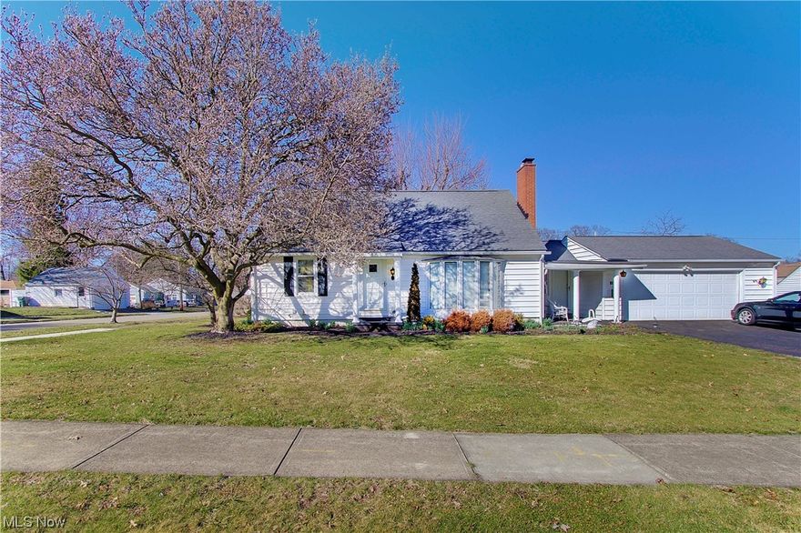 **We are in multiple offers.  Highest and best due by 3-20-23 at 5PM**  Lions and Tigers and Bears, oh my. No need to fret, this friendly 1500+ square foot bungalow is located in the heart of desirable polar bear country. Cozy corner lot is oozing with curb appeal. Yard is nice and flat, making lawn care a breeze. Saunter inside to the lovely living room complete with beautiful bay window, fabulous fireplace and pleasing architecturally arched doorways. Eat in kitchen, appliances are a gift to you, has oodles of cabinets and counter space and is very user friendly. Dining area has plenty of room for a larger table and pieces to display your pretty china or collectibles. Sliders off the dining area, leads to your cement patio in the backyard, making grilling as easy as 1, 2, 3. Breezeway is finished and a great place to curl up and binge watch your favorite shows. Two first floor bedrooms and HUGE bathroom with stand alone shower and large soaking tub, rounds out the first floor. Upstai