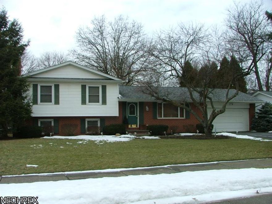 One Owner home.  Nicely maintained 4 level split in Plain Township. Looking for spacious rooms?  This is a must see. 3 BR and Main bath on upper level.  Living room, Kitchen & dining room on first floor with sliding door to 16 x 16 roof covered deck and fenced in backyard, wonderful for pets & Summer BBQs. Attached 2 car garage, and 14x16 storage barn. Lower level great for teens or in-law space.  Family room with gas fireplace, 2nd full bath, and BR4 (could be office, play room, hobby area). Unfinished basement level with built in storage shelves which remain.  Updates include but not limited to: HWT 2010, 100 amp breakers, Furnace 2006 (serviced 12/2013), both bath commodes & sinks 2010, BR4 carpeting 2014, garbage disposal 2013, and water softener 2009.  Call to preview inside today. A House to call HOME!