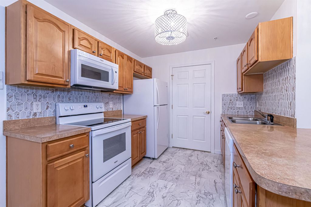 Photo of 65 Fordway Extension, Derry, NH 03038 (MLS # 5075805)