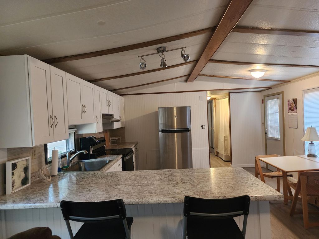 Photo of 9 Sargent Place #23, Gilford, NH 03249 (MLS # 5058895)