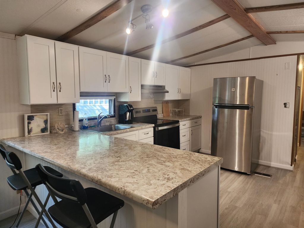 Photo of 9 Sargent Place #23, Gilford, NH 03249 (MLS # 5058895)