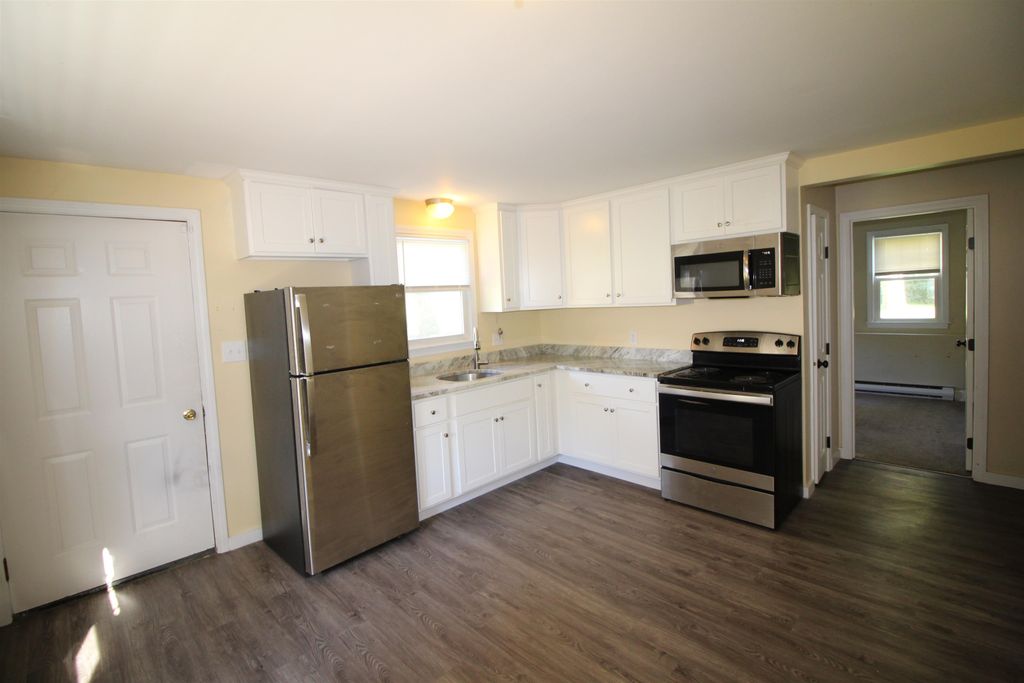 Photo of 88 FRANKLIN Street, Derry, NH 03038 (MLS # 5060380)