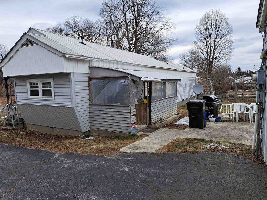 Photo of 37 SUGAR RIVER Drive, Claremont, NH 03743 (MLS # 5081054)