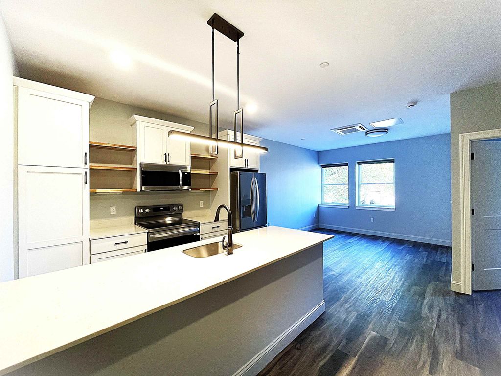 Photo of 25 Lowell Street #104, Manchester, NH 03101 (MLS # 5067181)