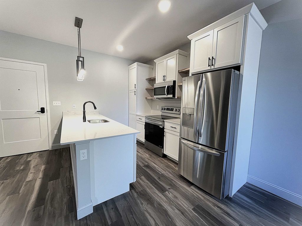 Photo of 25 Lowell Street #104, Manchester, NH 03101 (MLS # 5067181)