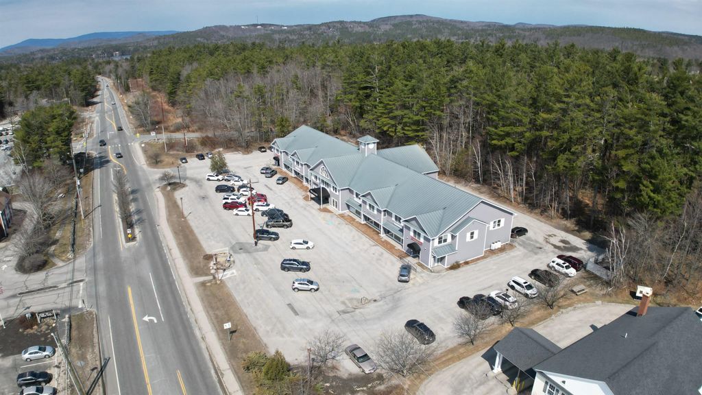 Photo of 276 Newport Road #205/207, New London, NH 03753 (MLS # 5084668)