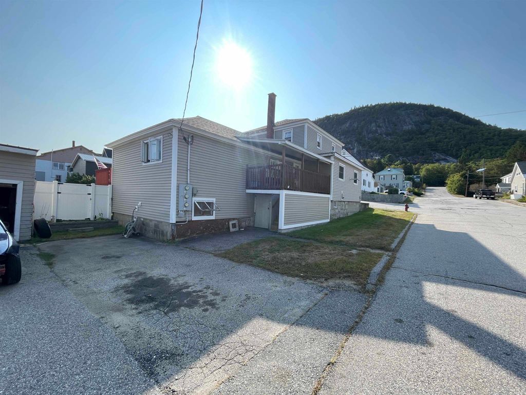 Photo of 820 Fourth Avenue, Berlin, NH 03570 (MLS # 5060791)