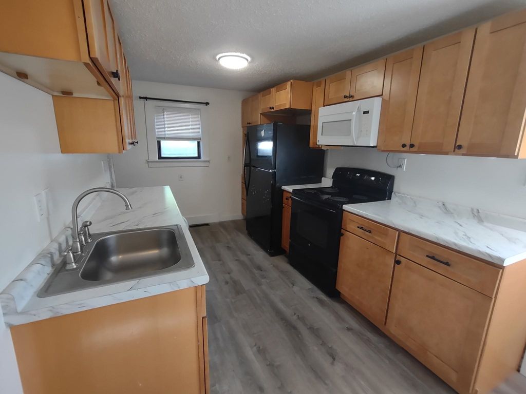 Photo of 105 Palmer Street, Claremont, NH 03743 (MLS # 5079470)