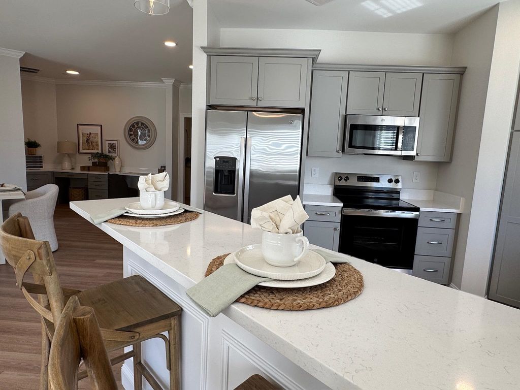 Photo of 74 Rockingham Road #102, Derry, NH 03038 (MLS # 5080615)